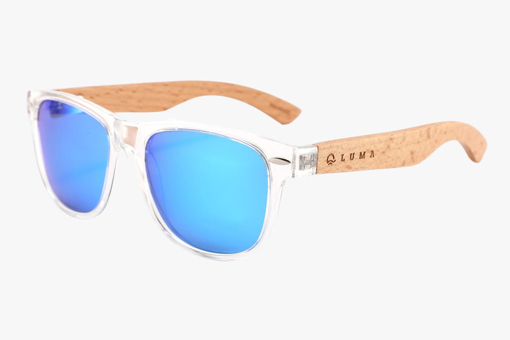 Sunglasses with blue lenses and wooden frame on a white background