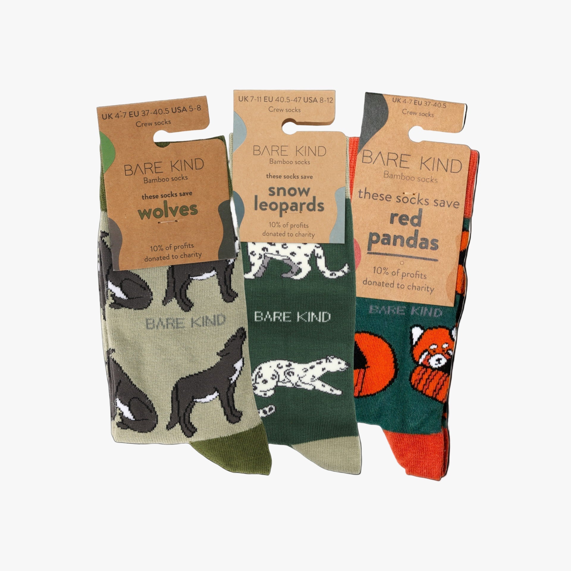 Three pairs of Bare Kind socks with animal-themed packaging on a white background